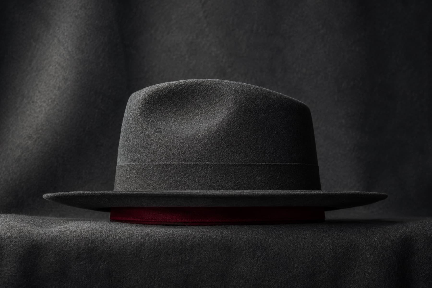 Fedora Blend: charcoal felt hat photographed whole under a single hard side light